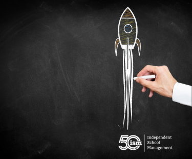 ISM Blog Hero Image - Chalkboard with spaceship written in chalk, and ISM 50 Logo