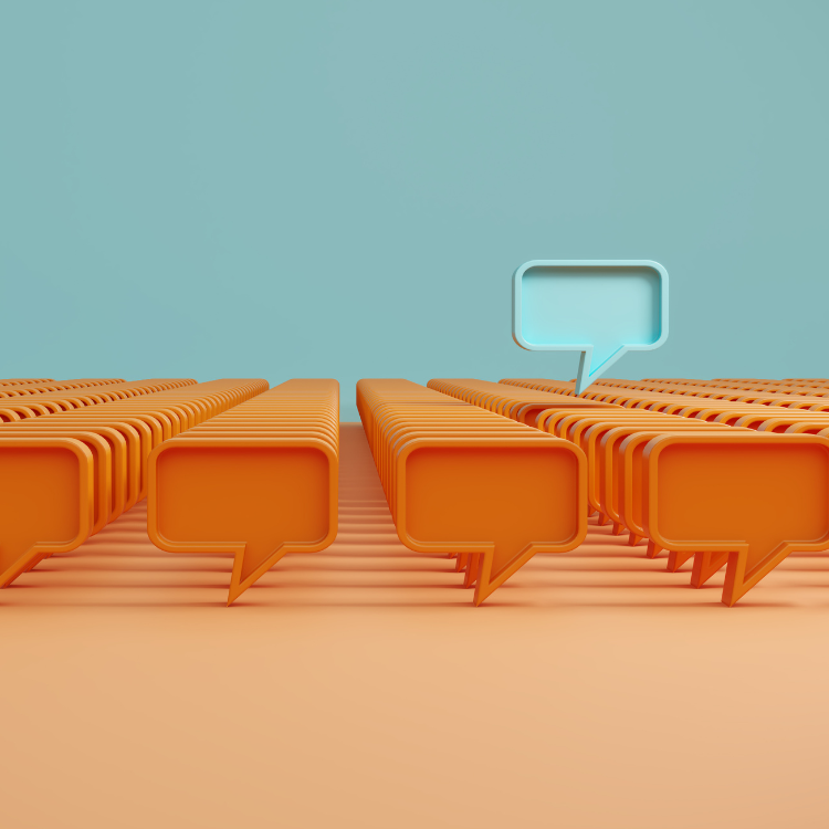 Illustration of many orange speech bubbles with one blue speech bubble standing out, symbolizing unique insights from school community surveys.