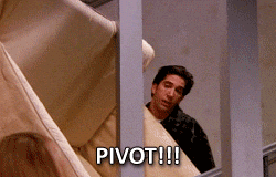 PIVOT! GIF - Ross Geller from Friends, trying to move his couch and panicking