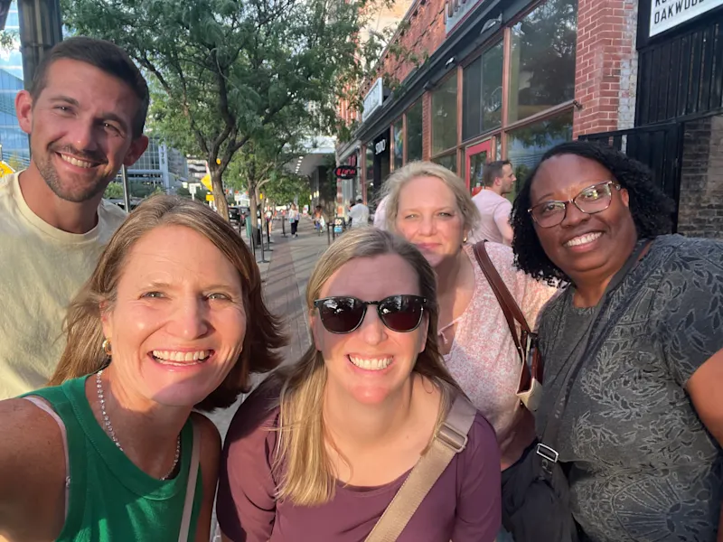 Four Wesleyan staff members who attended Summer Institute